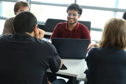 MSc class at emlyon business school with a lecturer addressing students in a modern classroom setting.
