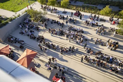 Aerial view of the outdoor campus steps at emlyon, where students gather to connect, study, and enjoy open-air student life spaces.