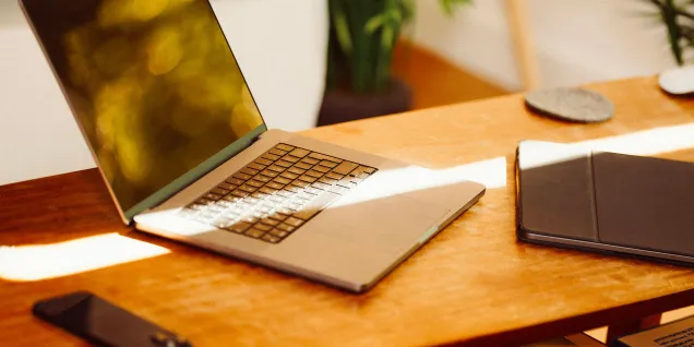 Luc Michalski A computer and other devices on a table