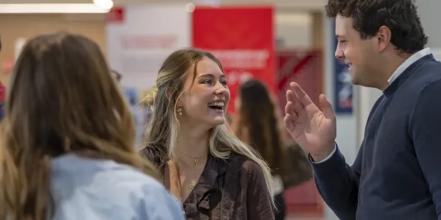 Students networking during an event at emlyon tech school, fostering connections, collaboration, and campus life.