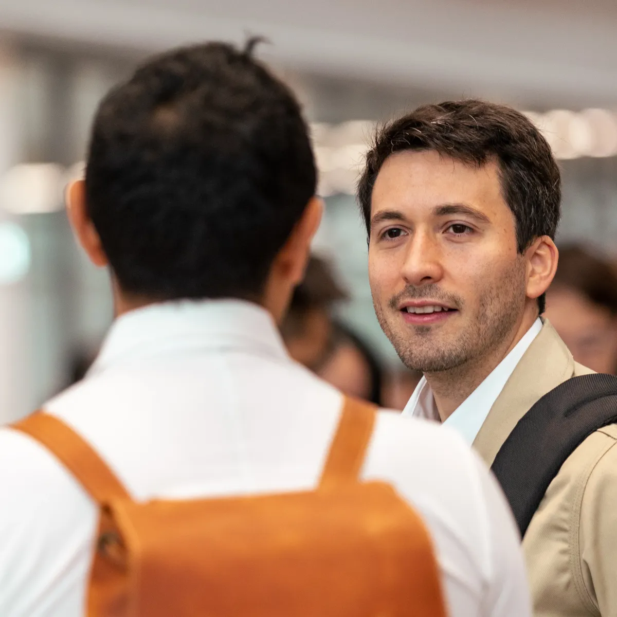 Some emlyon students talking inside the Lyon campus